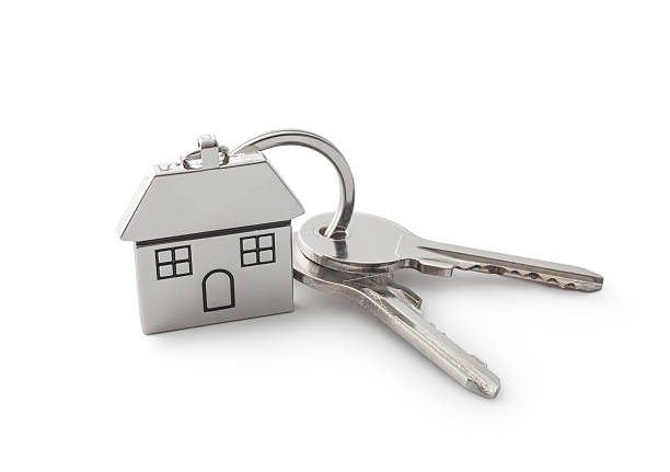 Grafika przedstawiające klucze oraz breloczek w formie domu