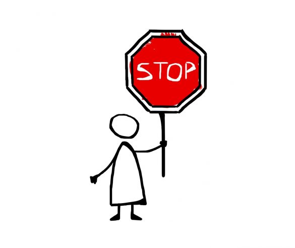 Rysunek dziecka, które trzyma znak STOP